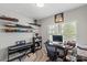 Bright office with decorative floating shelves, modern desk, and gray-beige marble rug for an inspiring workspace at 980 Bunker Trce, Rock Hill, SC 29730