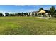 Large open green field with community pavilion at the edge and houses in the background at 980 Bunker Trce, Rock Hill, SC 29730