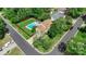 Aerial shot shows backyard with a private swimming pool, privacy fence, and green landscaping at 101 Canopy Ct, Mooresville, NC 28115