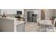 Bright kitchen with stainless steel appliances and white cabinets at 101 Canopy Ct, Mooresville, NC 28115