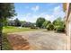 Wide concrete driveway leading to a traditional home at 10836 Fox Hedge Rd, Matthews, NC 28105
