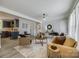 Open living area featuring hardwood floors, ceiling fan and views of the kitchen at 1090 Bowser St, Rock Hill, SC 29730