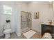 Modern bathroom with glass shower, white tile, and updated fixtures at 1090 Bowser St, Rock Hill, SC 29730