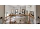 An open floor plan, with white brick accent wall, ceiling fan, and two large windows at 1090 Bowser St, Rock Hill, SC 29730