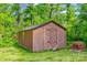 The shed in the backyard is spacious with a window for air at 1090 Bowser St, Rock Hill, SC 29730