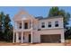 Charming two-story home featuring an attached two-car garage and classic design elements at 110 Canary Ln # 3, Mooresville, NC 28115