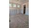 Spacious living room with bare drywall and windows providing natural light at 110 Canary Ln # 3, Mooresville, NC 28115
