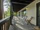 Spacious porch with room to relax and enjoy lake views, perfect for summer at 1114 Palmyra Dr, Tega Cay, SC 29708