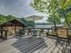 Spacious dock with seating and lake views, ideal for entertaining friends and Gathering at 1114 Palmyra Dr, Tega Cay, SC 29708