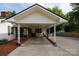 The home's roomy carport area also includes a screened-in back porch at 1115 Old Thompson Ave, Lancaster, SC 29720