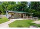 The detached garage has a covered patio and ramp access at 1115 Old Thompson Ave, Lancaster, SC 29720