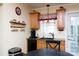Well-appointed kitchen with wooden cabinets, modern appliances, and natural lighting at 1115 Old Thompson Ave, Lancaster, SC 29720