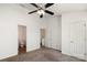 This bedroom offers two doors and a ceiling fan at 11229 Lions Mane St, Charlotte, NC 28273
