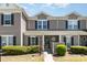 Charming two-story townhome with neutral siding, black shutters, and well-maintained landscaping at 11229 Lions Mane St, Charlotte, NC 28273