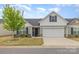 Charming home featuring a 2-car garage, landscaped yard, and inviting front entrance at 1125 Silvertrace Dr, Salisbury, NC 28144