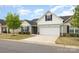 Charming home featuring a 2-car garage, landscaped yard, and inviting front entrance at 1125 Silvertrace Dr, Salisbury, NC 28144