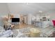 Spacious living room featuring a modern open floorplan with wood-look floors at 1125 Silvertrace Dr, Salisbury, NC 28144