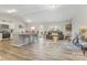 Spacious living room featuring a modern open floorplan with wood-look floors at 1125 Silvertrace Dr, Salisbury, NC 28144