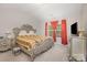 Bright primary bedroom with a stylish bed frame, matching dresser, and soft carpeting for ultimate comfort at 1125 Silvertrace Dr, Salisbury, NC 28144