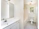 Bathroom featuring a vanity, toilet, and shower/tub combo at 12016 Gemstone Ct, Charlotte, NC 28269