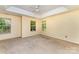 Bedroom showcasing three large windows, offering natural light at 12016 Gemstone Ct, Charlotte, NC 28269
