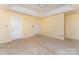 Spacious bedroom featuring a ceiling fan and two closets for ample storage at 12016 Gemstone Ct, Charlotte, NC 28269
