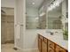 Bright bathroom features a glass shower, vanity, and neutral tones at 1222 Kings Bottom Dr, Fort Mill, SC 29715