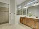 Bathroom with a double sink vanity, natural lighting, and glass shower at 1222 Kings Bottom Dr, Fort Mill, SC 29715
