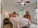 Comfortable bedroom featuring a ceiling fan, light-colored walls, and lots of natural light at 1222 Kings Bottom Dr, Fort Mill, SC 29715