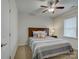 Cozy bedroom with soft lighting, a ceiling fan, and a neutral color scheme at 1222 Kings Bottom Dr, Fort Mill, SC 29715