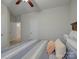 Bright bedroom featuring warm accents, a ceiling fan and neutral colored walls at 1222 Kings Bottom Dr, Fort Mill, SC 29715