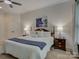 Comfortable bedroom with a ceiling fan, soft lighting, and neutral decor at 1222 Kings Bottom Dr, Fort Mill, SC 29715