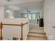 Upstairs bonus room with a ceiling fan and lots of natural light at 1222 Kings Bottom Dr, Fort Mill, SC 29715