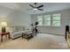 Bright bonus room with a ceiling fan and large windows at 1222 Kings Bottom Dr, Fort Mill, SC 29715