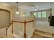 A comfortable loft area with carpet and large windows for plenty of natural light at 1222 Kings Bottom Dr, Fort Mill, SC 29715