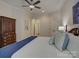Spacious main bedroom featuring a ceiling fan, neutral walls, and ensuite access at 1222 Kings Bottom Dr, Fort Mill, SC 29715