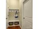 A stylish mudroom features a convenient built-in bench with storage and coat hooks at 1222 Kings Bottom Dr, Fort Mill, SC 29715