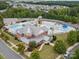 Aerial view of community pool, waterpark and clubhouse in a Gathering neighborhood at 1222 Kings Bottom Dr, Fort Mill, SC 29715