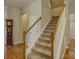 Staircase features wooden handrails and carpeted steps leading to the upper level at 1222 Kings Bottom Dr, Fort Mill, SC 29715