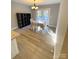 Cozy dining area with French doors, ample natural light, and stylish decor that provides the perfect ambiance at 126 Pleasant Hill St, Lancaster, SC 29720