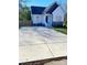Charming home featuring a well-manicured yard and a spacious paved driveway at 126 Pleasant Hill St, Lancaster, SC 29720