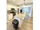 Modern kitchen with stainless steel appliances, granite countertops, and a central island with a sink at 126 Pleasant Hill St, Lancaster, SC 29720