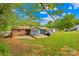 Large backyard with a deck, a gazebo, and ample green space at 1279 Rocky Creek Rd, Shelby, NC 28152