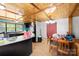 Dining room featuring wood paneling and natural light at 1279 Rocky Creek Rd, Shelby, NC 28152