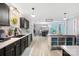 Charming kitchen with contrasting countertops, modern appliances, and an island open to the dining area at 1279 Rocky Creek Rd, Shelby, NC 28152