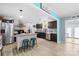 Farmhouse-style kitchen with modern appliances, rustic accents, an island, and ample counter space for cooking at 1279 Rocky Creek Rd, Shelby, NC 28152