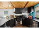 Kitchen with stainless steel appliances and ample counter space at 1279 Rocky Creek Rd, Shelby, NC 28152