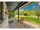 Inviting front porch with comfortable seating and a view of the landscaped yard at 1279 Rocky Creek Rd, Shelby, NC 28152
