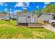Exterior view of storage shed with garage door at 1279 Rocky Creek Rd, Shelby, NC 28152