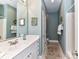 Well-lit bathroom featuring a single sink vanity and modern fixtures at 172 Harper Lee St, Davidson, NC 28036